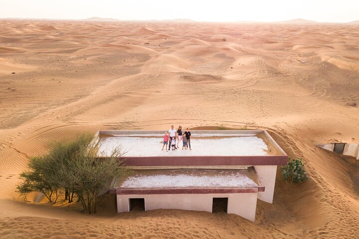 Explore the serene beauty of Dubai's abandoned village capturing stunning desert views while enhancing your photography skills under the guidance of a local expert. Adventure awaits!